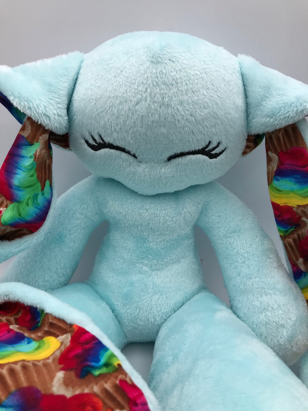 Pastel Blue minky Cabbit with rainbow cupcakes