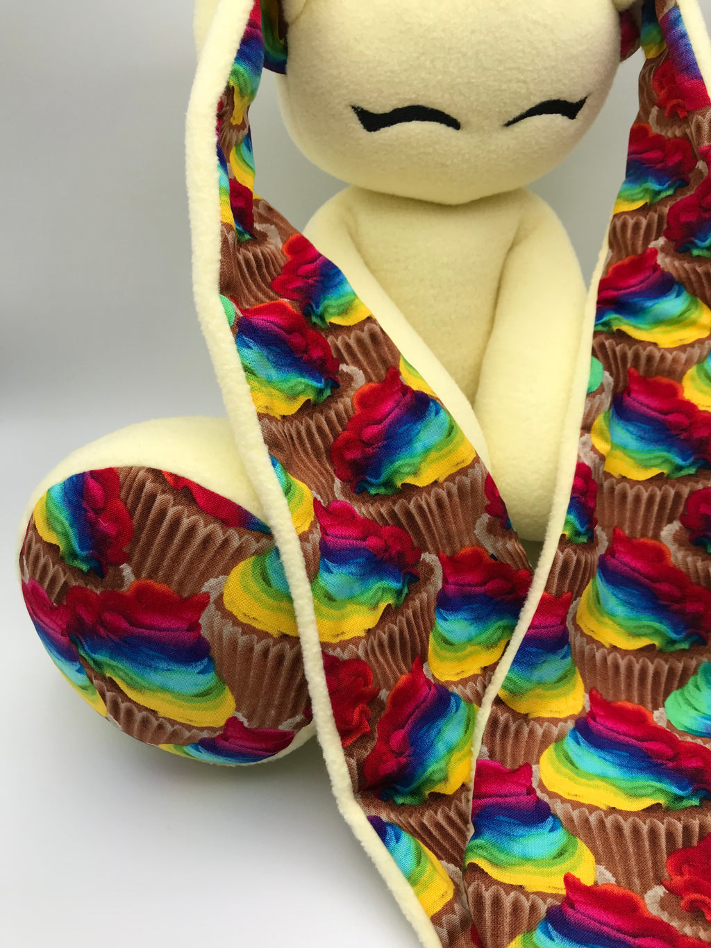 Yellow Cabbit with rainbow cupcakes