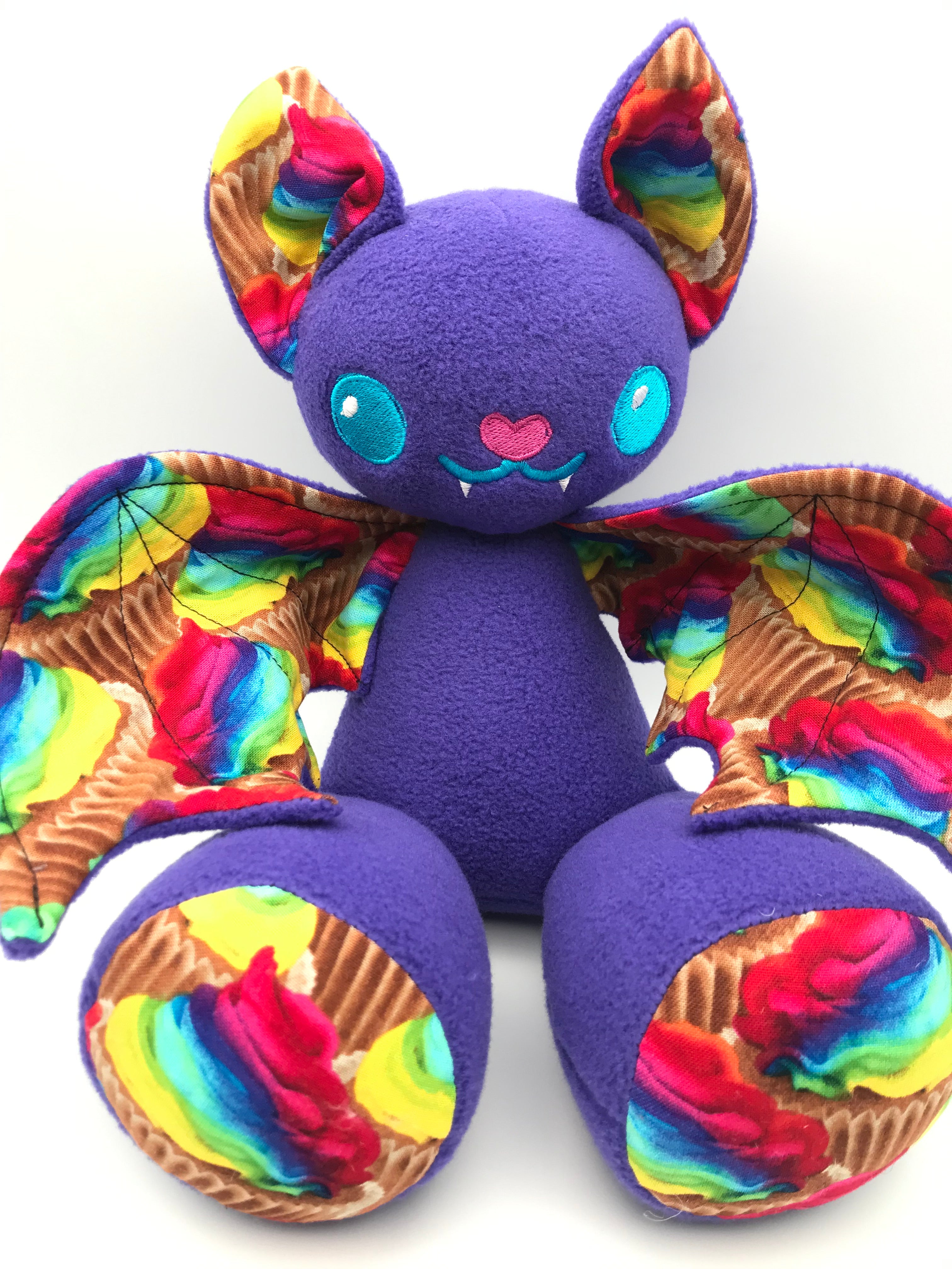 Small purple cupcake bat