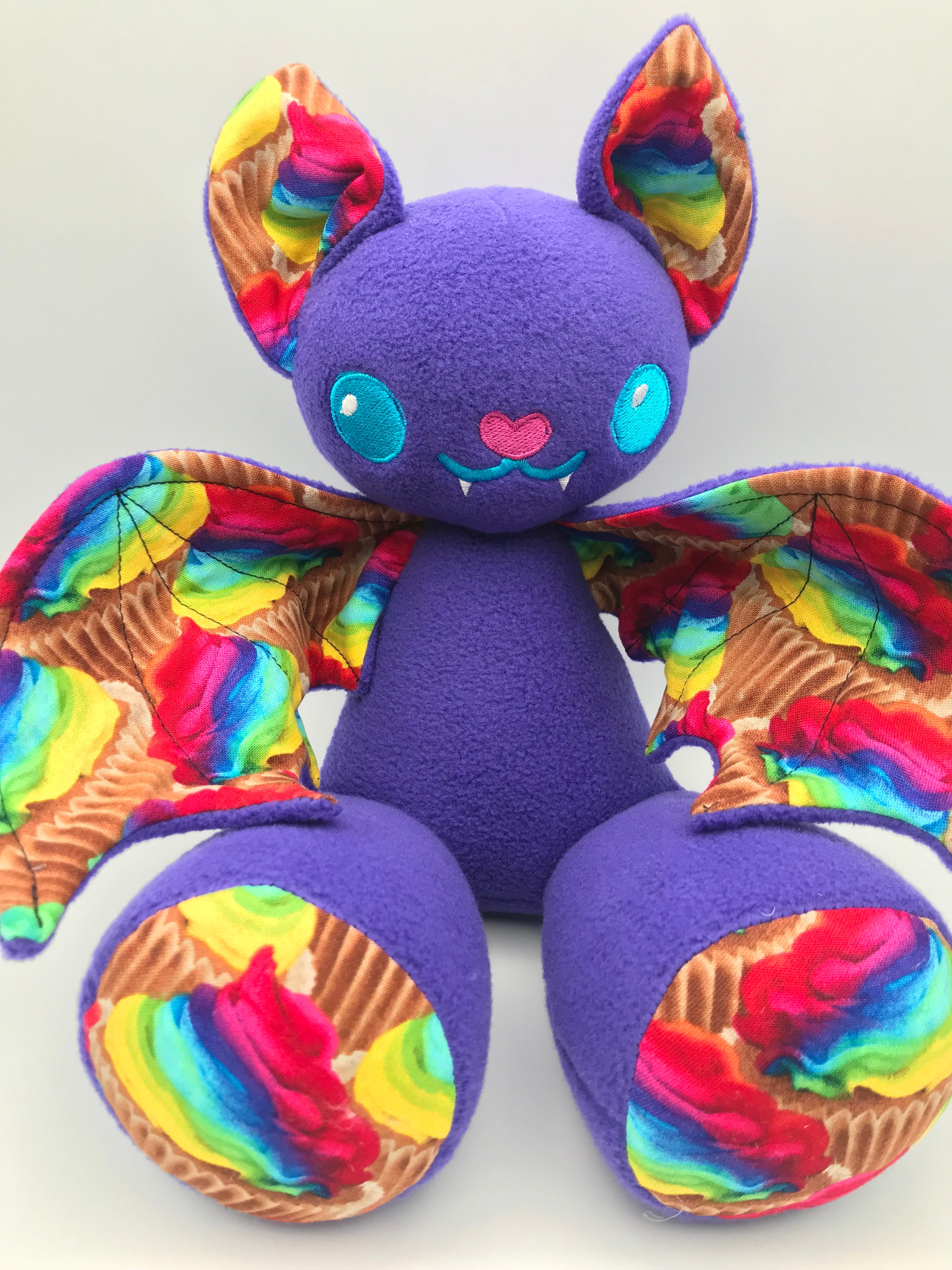 Small purple cupcake bat