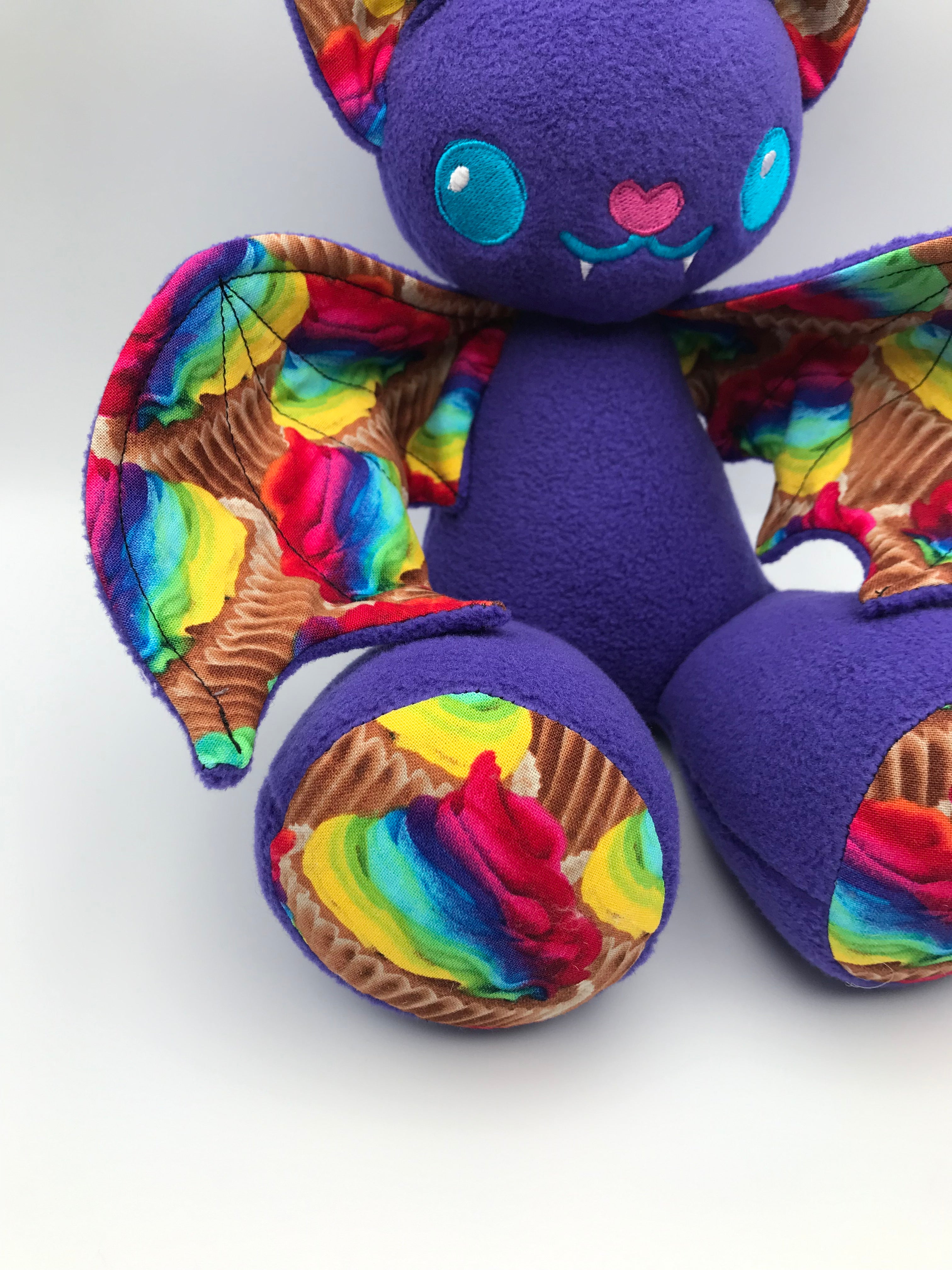 Small purple cupcake bat