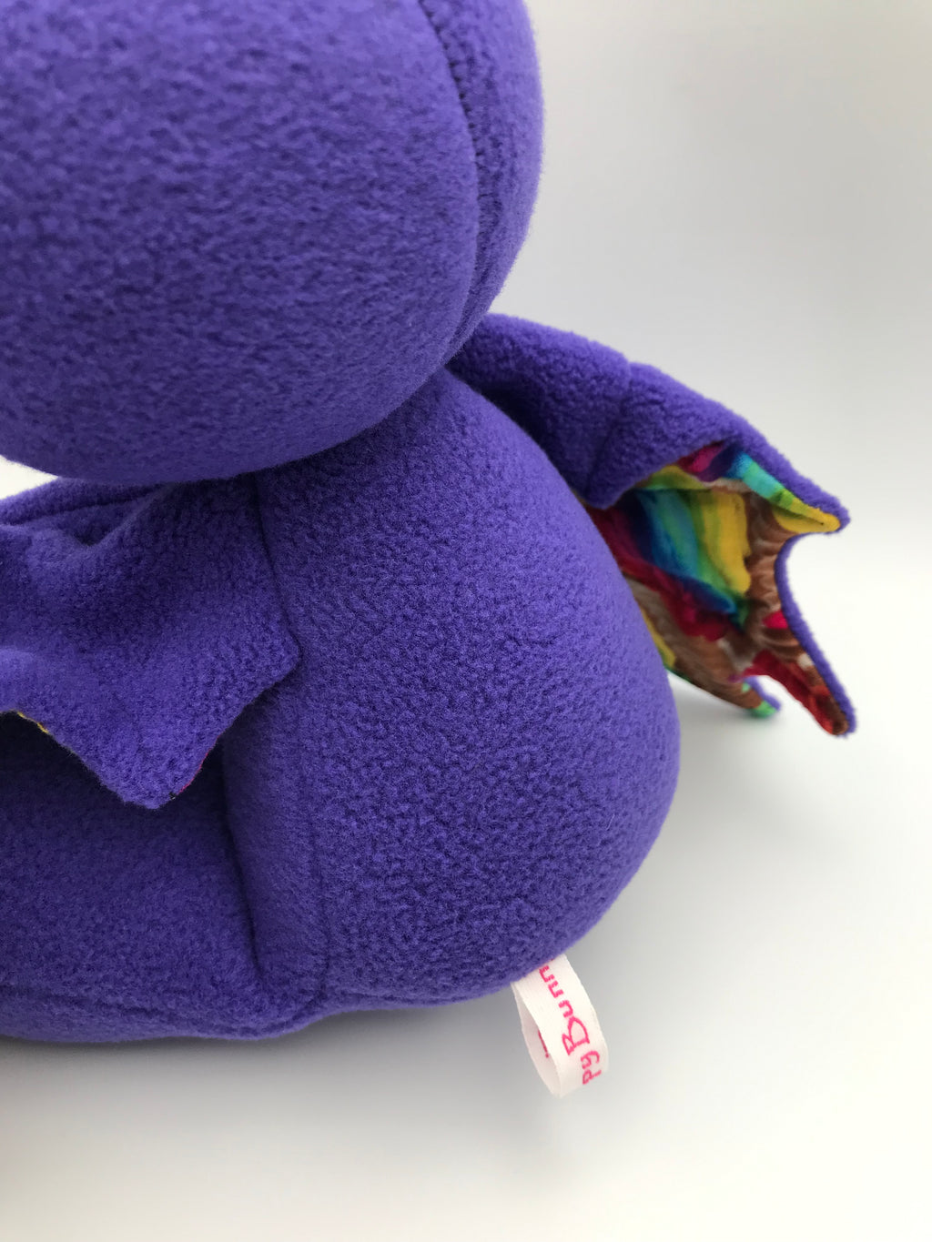 Small purple cupcake bat
