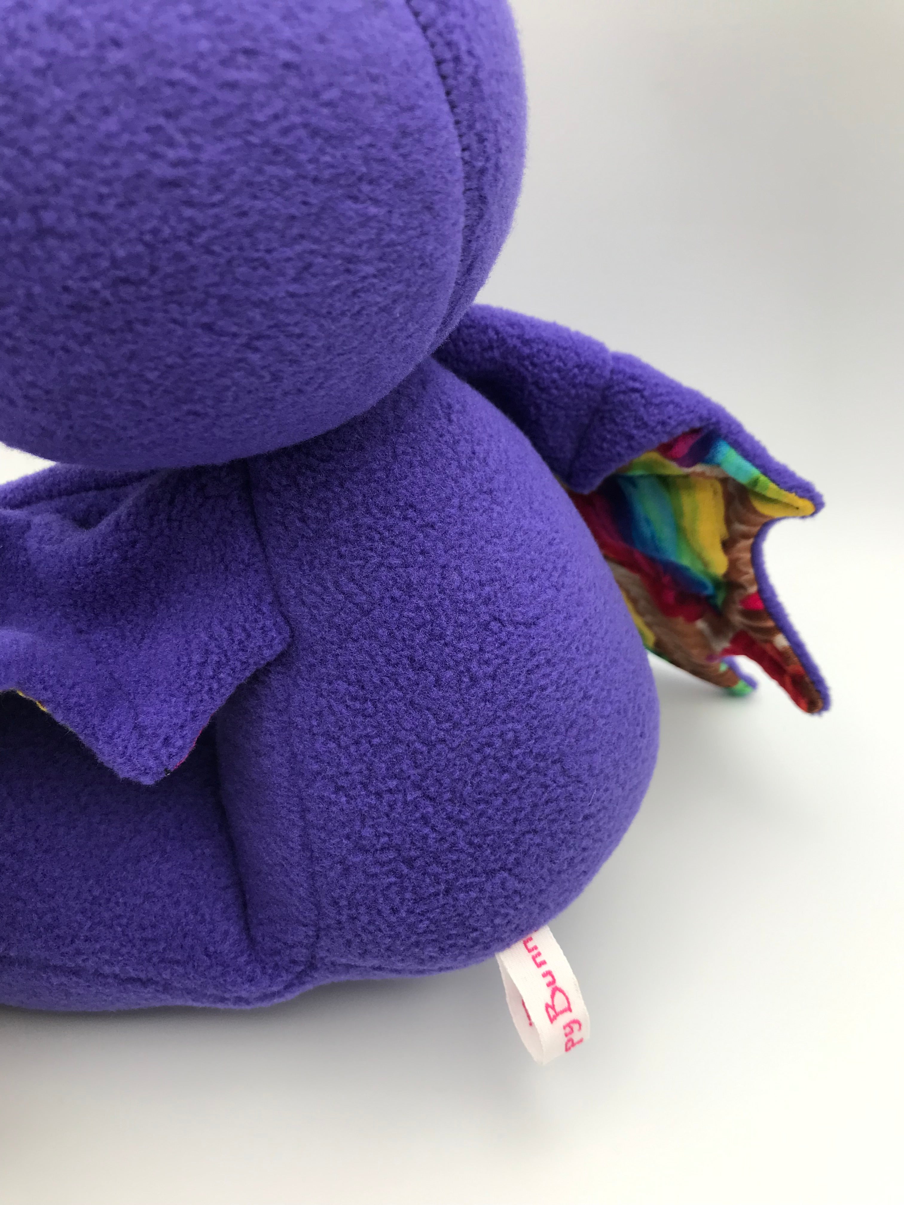 Small purple cupcake bat