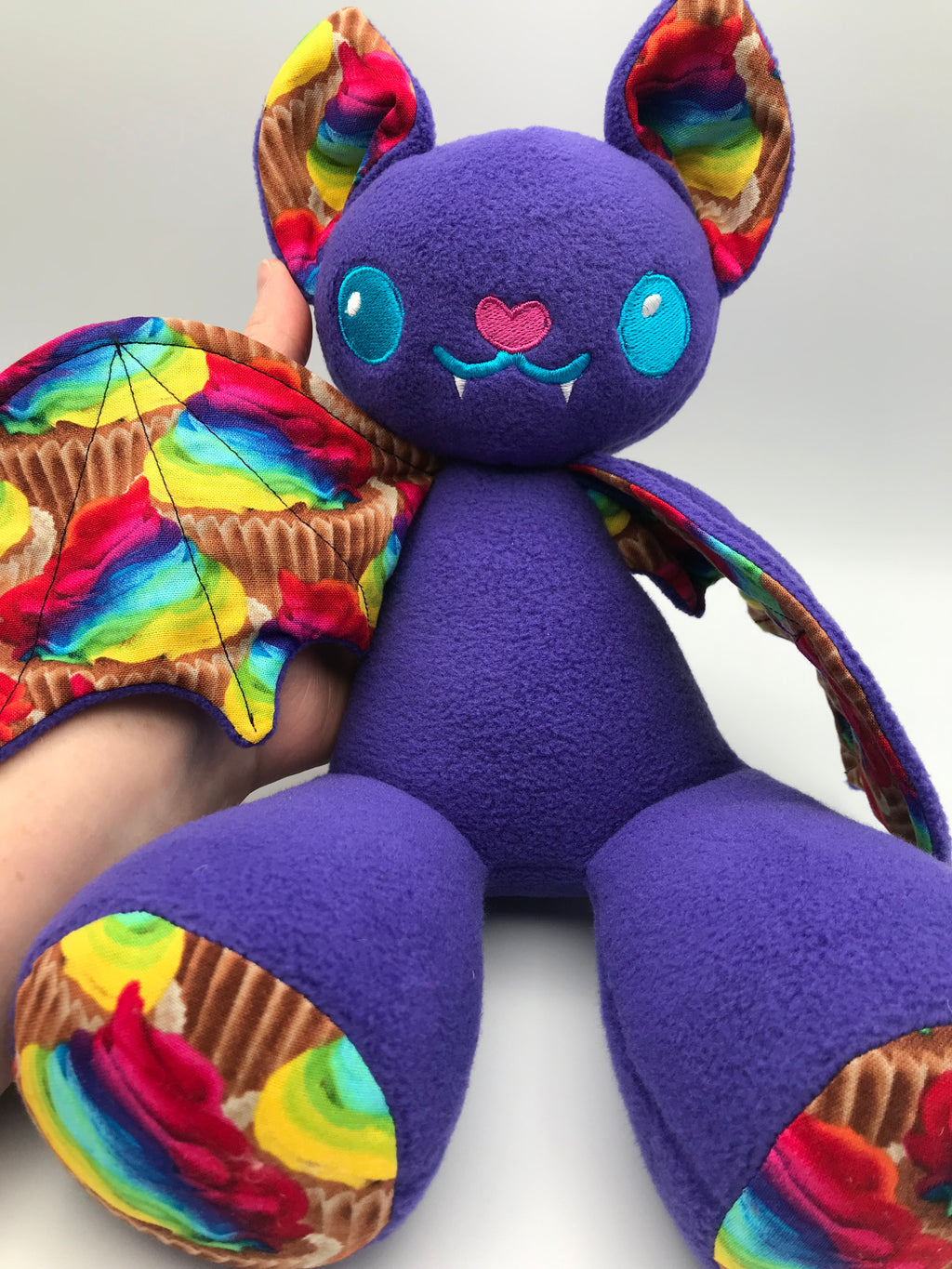 Small purple cupcake bat
